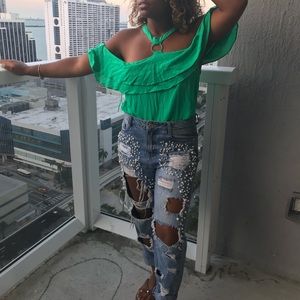 Green off-shoulder bodysuit